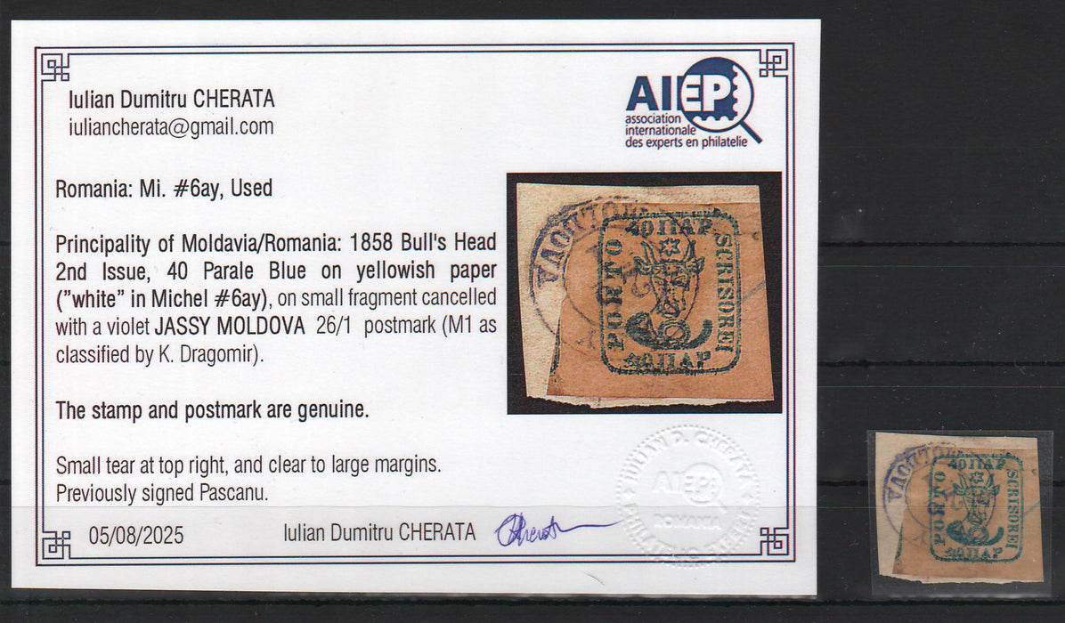 Romania 1858 Cap de bour emisiunea a II-a 40PAR albastru pe hartie galbuie, pe fragment, stampila intreaga JASSY MOLDOVA violet. Certificat autenticitate CHERATA, semnat PASCANU